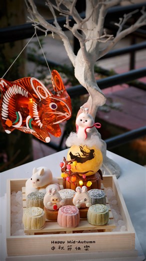 Introducing our Happy MoonCake Gift Set! This Mooncake set comes with extra delectable French desserts as well a signature handmade Jade Bunny and Mooncake clay figurine as well as moon lamp centerpiece! Celebrate with loved ones and family with this stunning showpiece while indulging with our signature handmade chewy flavoured mochi snowskin Mooncakes as well as our French desserts! This set includes: • One handmade mid autumn clay figurine • 6 pieces mochi snowskin mooncakes of different flavo