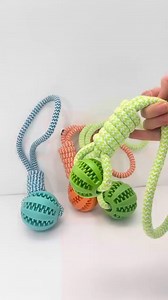 Keep your small dog entertained with the Ball And Rope Chew Toy! This durable toy is perfect for interactive games like fetch and tug-of-war, combining a tough rope with a chewable ball. It’s a great way to promote physical activity and dental care in your furry friend. | Cat Lovers In The World