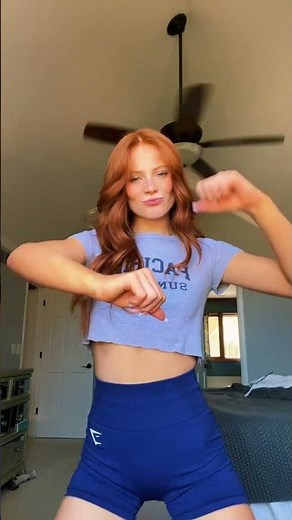 Redhead girl in a short top