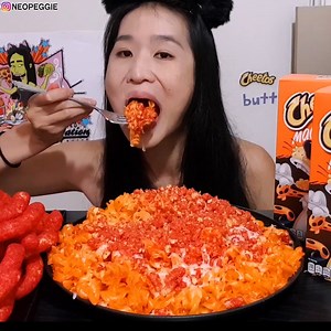 55K views · 2.7K reactions | Cheesy Mac and cheese!! Eating Cheetos mac n cheese topped with Flamin Hot Cheetos! #mukbang #macncheese #cheetos | Peggie Neo | Facebook