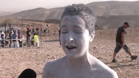 Hundreds of Israelis strip naked for photo shoot near the Dead Sea