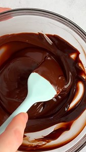 Sometimes equal parts butter and chocolate melted together and cooled slightly is an even better dessert coating than classic ganache (which is heavy cream and chocolate)! Shot this behind the scenes clip for @livewellbakeoften Mint Brownies recipe! | It's Raining Flour