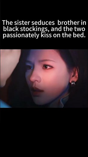 sister seduces her younger brother in black stockings, and the two passionately kiss on the bed.