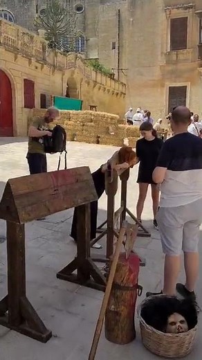 woman in pillory stocks in Medieval Mdina Festival 2022 #malta #shorts