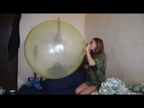 Looner girl Ilka blow to pop really BIG balloon (short video)