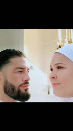 Roman Reigns and Ronda Rousey in Traditional Muslim Attire
