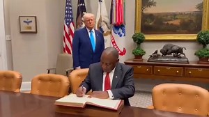 Recap: President Cyril Ramaphosa signs at the White House during a meeting with U.S. President Donald Trump | Zebediela Voice