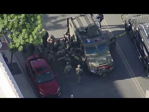 Man barricades himself inside California bank with hostages after bomb threat