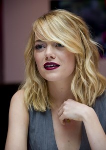Emma Stone with blonde wavy hair Rare Gallery wallpaper