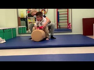 NDT therapy to a quadriplegic dystonic child with CP/ Roll therapy for sitting position