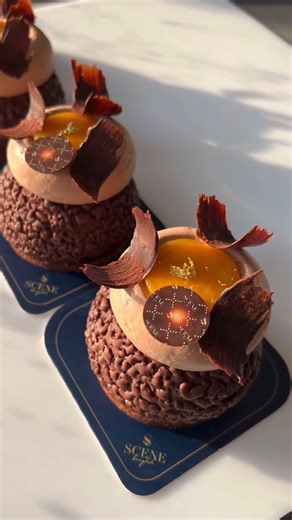 Dive into a world of exotic indulgence with Choux Exotique by @paulo.bairan for @scenebangkok.th! 🍫✨ Indulge in the perfect harmony of chocolate choux, chantilly Manjari 64%, exotic coulis, cremeux chocolat, exotic caramel, and chocolate polenta crunch. Pure bliss in every bite! ❤️🌟 . . . #pastryart #pastrychef #chef #pastry #pastryporn #pastrychefs #pastrychefsofinstagram #pastrycheflife #pastrylove #pastrylover #pastrypassion #pastrylife #pastryarts #pastryinspiration #instapastry #patisseri