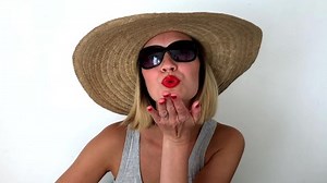 Woman Portert Make Gesture Kiss Sun Stock Footage Video (100% Royalty-free) 1054874732 | Shutterstock