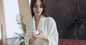 Beautiful woman applying cream on hand skin, Spreading the applied moisturizing hand cream so that it gets soaked. Treatment dermatology and cosmetic with moisturiser. scrubbing.
