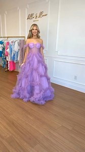 This ruffle formal dress is DREAMY 💜✨ so stunning for prom, black tie weddings, engagement photos and more! Shop our “Speak Now Off Shoulder Ruffle Bustier Formal Dress” available in sizes 0-16 on shopbellaandbloom.com! | Bella & Bloom Boutique