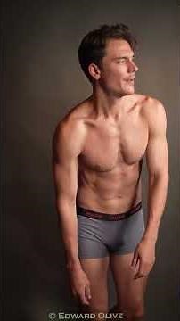Male model casting for underwear muscular lean posing in boxer shorts with photographer audition