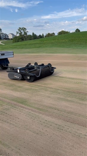 After topdressing with sand, we finish up by integrating the sand into the newly punched holes. | The Legacy Golf Club