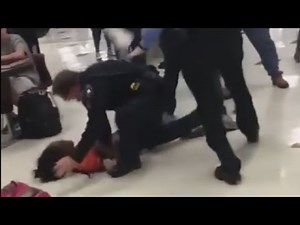 Activists want officer fired over school fight actions