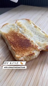 Try our HI Kine Hot Dawg - with a deep fried, panko & tempura battered beef frank, spicy aioli, unagi sauce, bonito flakes, and nori strips - you need to try this! Only available this Friday in Redmond during our Aloha Friday Happy Hour! | Sam Choy's Poke To The Max