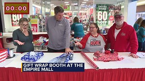 Morning anchors Elle Dickau and Erik Thorstenson took on Ben Davis and Patty Dee from KKRC at the Gift Wrap Booth at the Empire Mall to see who could wrap a gift the fastest with just one hand!🎁 (and without cheating) | Dakota News Now