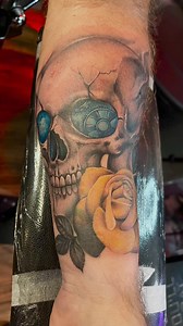 12 reactions |  Check out this realistic skull with blue gear eyes and a bright yellow rose. This coverup piece was designed and tattooed by our head tattoo artist Carolyn.  #skulltattoo #citruscounty #tattoos #yellowroses #realismtattoo #yellowrosetattoo #coveruptattoo | America's Best Tattoos | Facebook