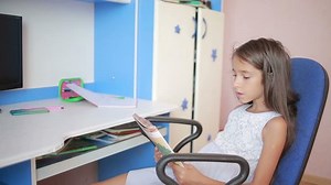 Schoolgirl Doing Homework Table Leafs Through: стоковое видео (без лицензионных платежей), 19431955 | Shutterstock
