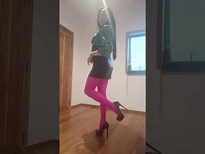 leather mini skirt satin top pantyhose and heels