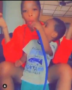 How would you allow a little child smoke Shisha? This is wrong on so many levels 🤦🏽‍♂️ | OMGVoice Nigeria