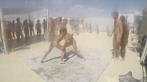 naked oil wrestling at Burning Man 2015