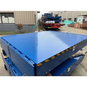 [Hot Item] Rampas telescópicas de aire duraderas con borde oscilante, elevador de vehículos, nivelador de muelle, plataforma de trabajo, puente de abordaje hidráulico