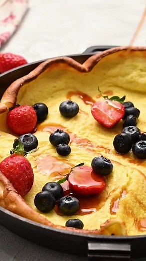 German Pancakes are a hot and puffy golden pancake that only requires 5 minutes of prep! Recipe: https://therecipecritic.com/german-oven-pancake/ | The Recipe Critic