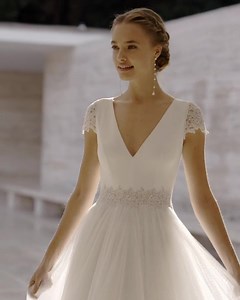 This elegant #RosaClaraCouture wedding dress features a tailored bodice adorned with delicate lace motifs detailing on the waist and sleeves with a dreamy tulle skirt. https://bit.ly/3spW6Sp | Designer Bridal Room, Hong Kong | Facebook