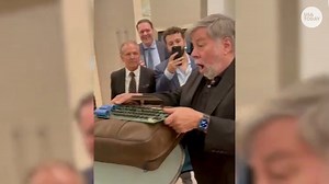 1K views | A video captured in 2021 went viral again showing Apple co-founder Steve Wozniak delighted in signing a 1976 Apple I motherboard he created. | USA TODAY Video | Facebook