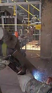 Welder prepares the weld test in the 45° position for TIG welding.