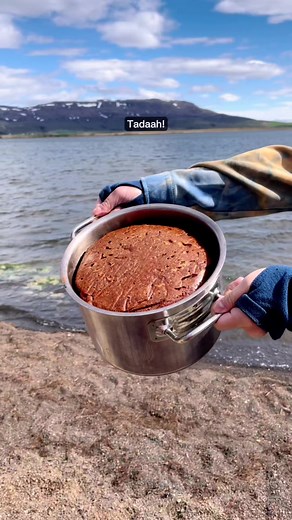 In Iceland, the ground is so hot that you can literally bake bread in it! 🇮🇸 This rye bread is baked by being buried underground near a geothermal beach, resulting in a dense and tasty Hverabraud! 🍞 | Guide to Europe