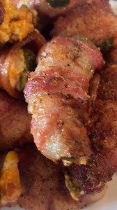 2.6K views | Smoked Jalapeño Poppers   @dpb1982 Slice & remove seeds from jalapeños stuff with a mixture of softened cream cheese, shredded cheddar cheese and @neilsarap dayuum hot rub wrap in bacon add more seasoning to the top cook at 300 with @bearmountainbbq apple pellets. | Bear Mountain BBQ | Facebook