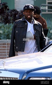 Rapper 50 Cent leaves the "Chelsea Lately" show studios with his arm in a cast after filming a spoof video alongside Internet sensation Keenan Cahill for Chelsea Handler's show. 50 Cent, who is reported to be dating Handler, filmed the video for his song "Down On Me" at the studio before Cahill's appearance on the show. Handler and 50 Cent were reportedly spotted out together in New Orleans in early October and have been seen out in LA together several times since. Both have denied a romance. Lo