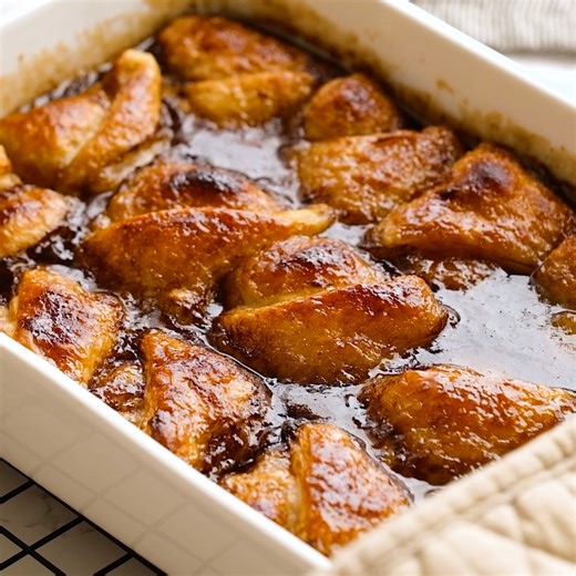 Imagine a dish of hot, chocolatey and strawberry pastry goodness. That’s what this baked Strawberry Dumplings recipe is all about, and there are few things tastier than when served warm with a scoop of vanilla ice cream. ⭐RECIPE: https://reluctantentertainer.com/strawberry-dumplings/ | Reluctant Entertainer