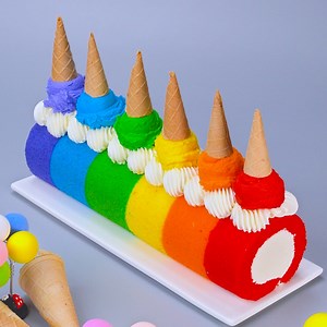 26K views · 318 reactions | Rainbow swiss roll cake | Cake Junkie | Facebook