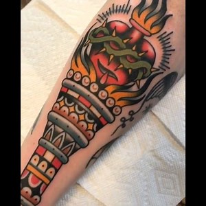 A traditional sacred heart torch mashup by Phil DeAngulo at Allied Tattoo in Brooklyn. 🔦 #TATTOODO | Tattoodo