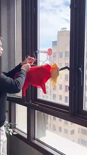 Minimalist wall-mounted clothes rack for storage