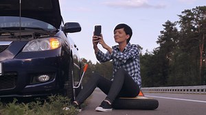 Woman Stranded With Flat Tire Person On Stock Footage SBV-317012967 - Storyblocks
