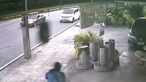 10K views | Close call! A flying tire barely missed a woman standing outside a car shop. | USA TODAY Video | Facebook