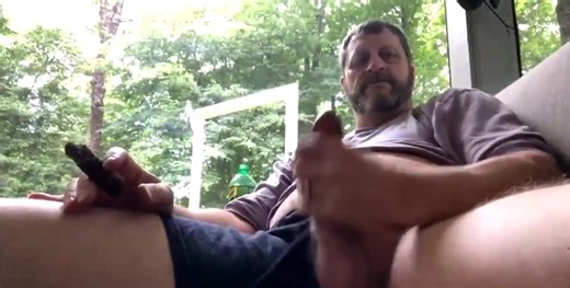 Cigar smoker jacks his pipe