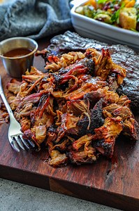 Root beer is Bon Appeteach's secret weapon for smoked pork steaks. It'll get you that candied melt-in-your mouth flavor without any bells or whistles. | Oklahoma Joe's Smokers