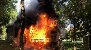 Fire started by lawn mower destroys Winona Lake house