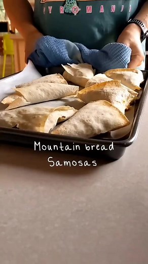 Mountain bread samosas by veggie_nerd This simplified version uses mountain bread instead of pastry which works amazingly well and makes them a bit healthier but still very moreish! I've used TVP in these but I've previously used crumbled tempeh which is also super delicious! Ingredients: 1 pack mountain bread (8 wraps) 2 large potatoes, diced 2 large carrots, diced 1 cup frozen peas 100g textured vegetable protein (soy mince) 2 TBS tomato paste 1 TBS curry powder 1.5 cups water 100ml coconut mi