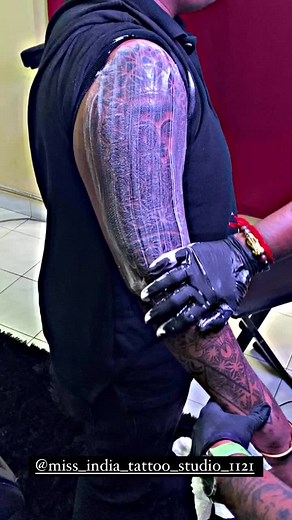 Tattoo Process Featuring Intricate Buddha Design