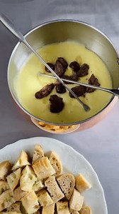 clip-3995021623-melted-cheese-fondue-meat-bread-cubes-lodge