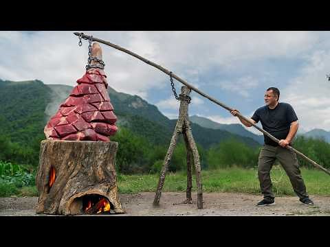 Slow-Cooked Beef Leg Inside a Smoldering Log Over Fire