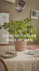 DIY // Flowerpot cover made of yarn // Yarn can be transformed into much more than just garments, the sisters believe. Immerse yourself in a creative moment, and create a cosy flowerpot cover out of yarn with a knitting loom. Find the guide for this DIY project in the sisters’ app and on the website https://www.sostrenegrene.com/en-gb/diy/-d-14987 | Søstrene Grene